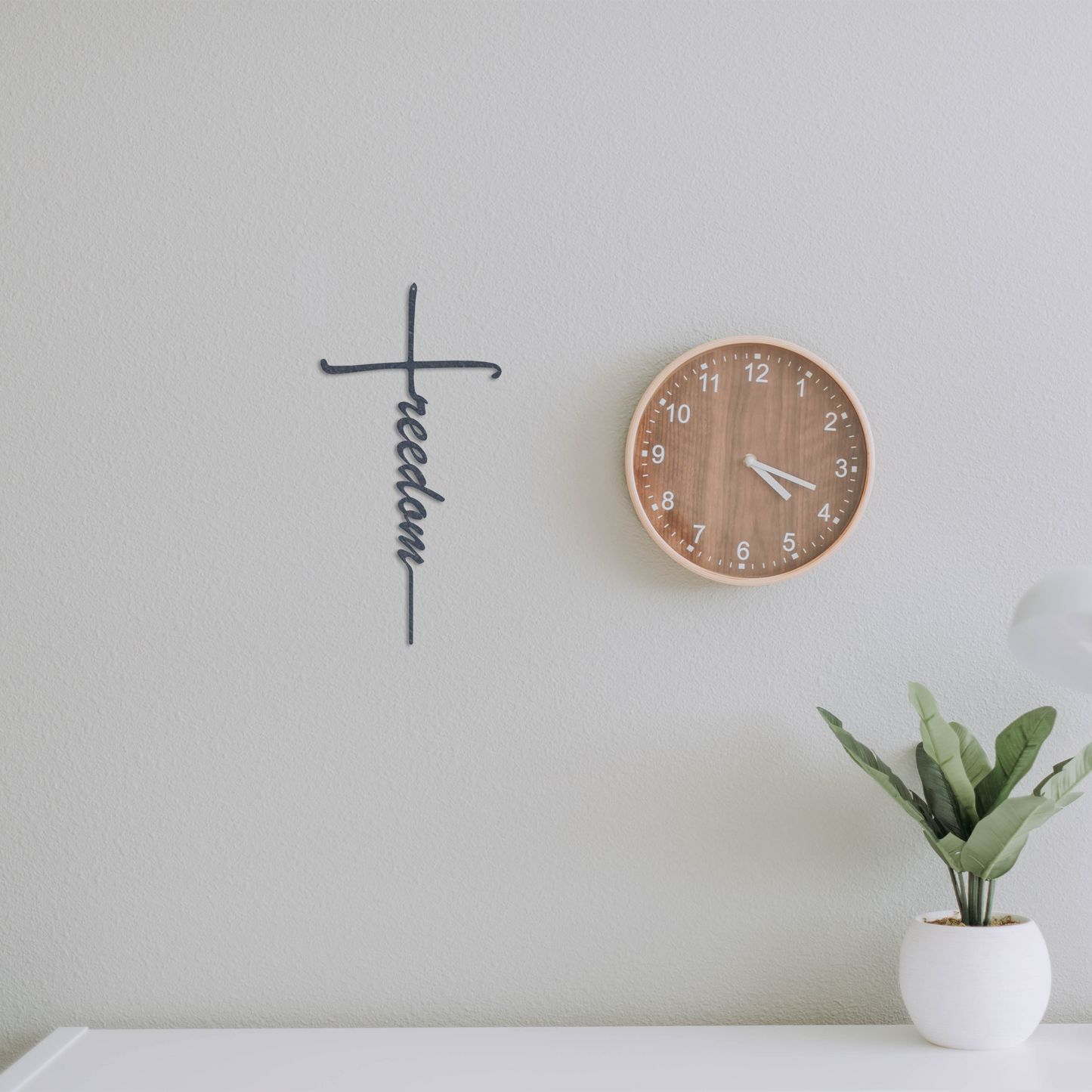 Metal wall cross symbolizing faith and liberty