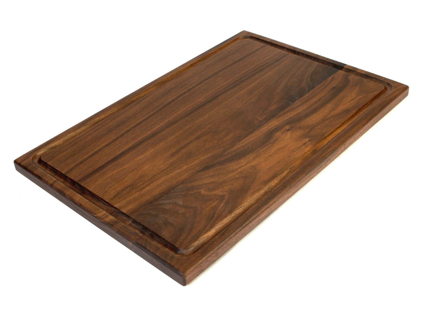 Wooden cutting board on a white background