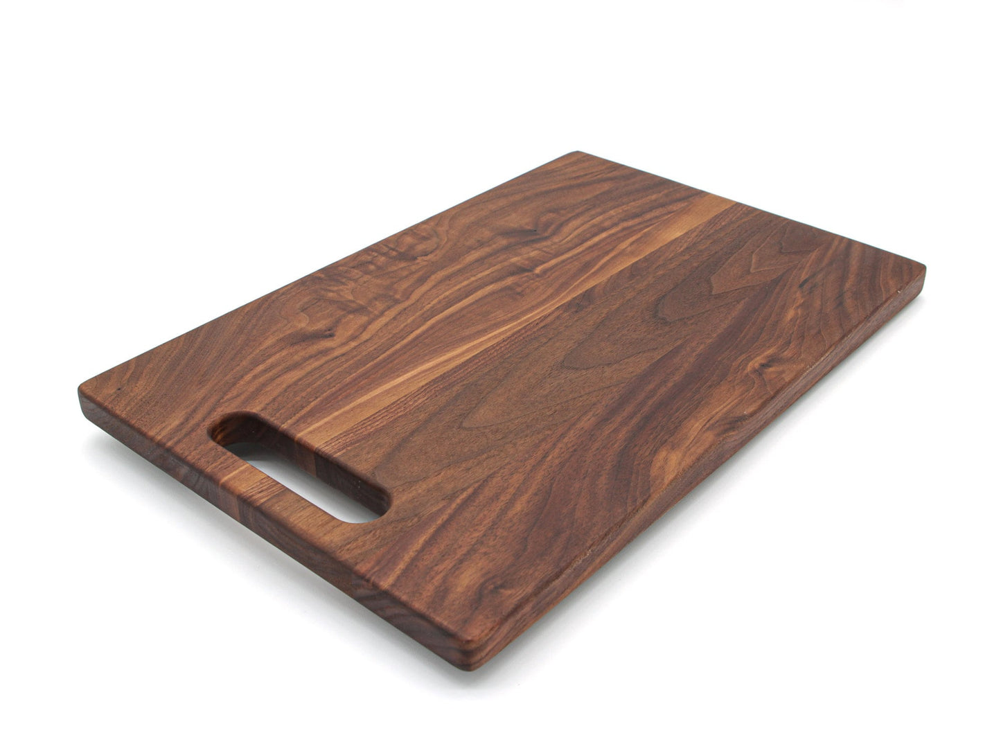 Wooden cutting board with a handle on a white background