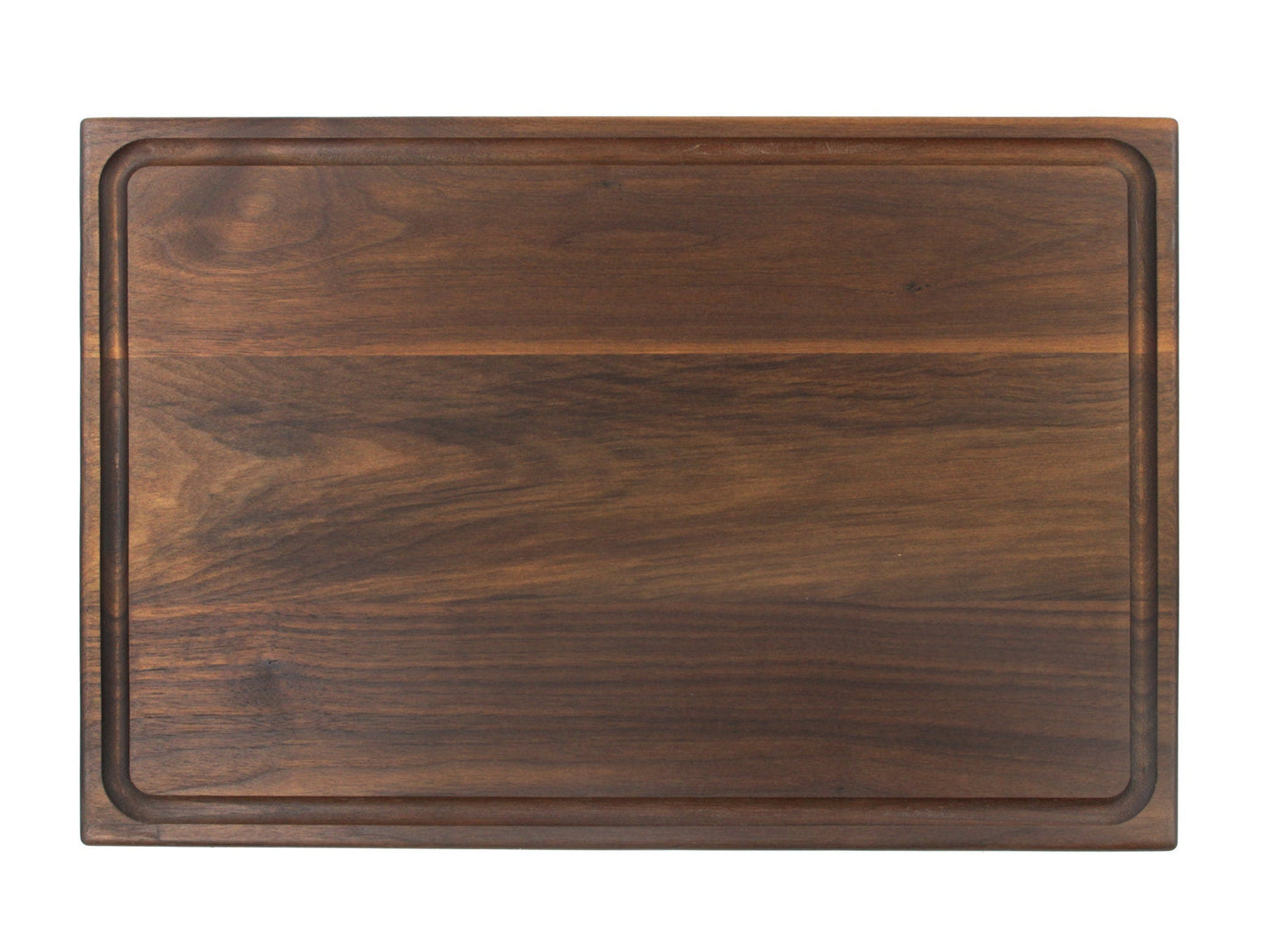 Wooden cutting board with a dark brown finish on a white background