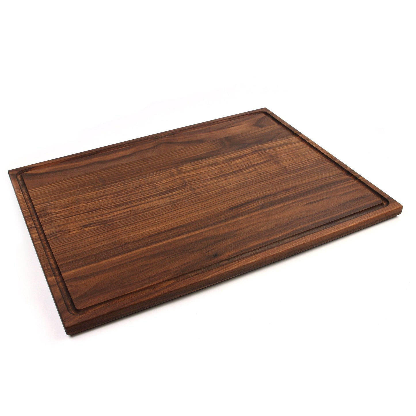 Wooden cutting board on a white background