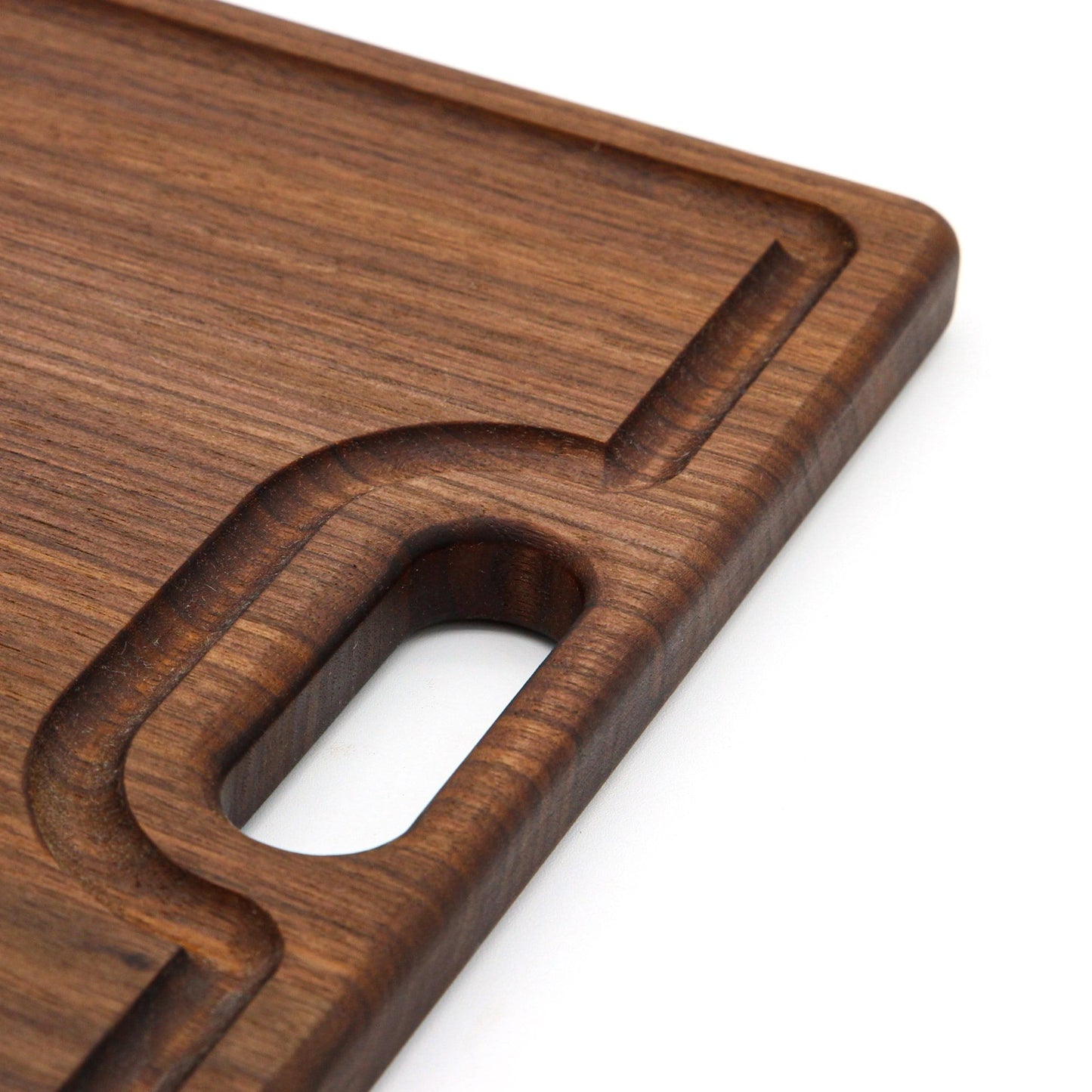 Wooden cutting board with a handle on a white background