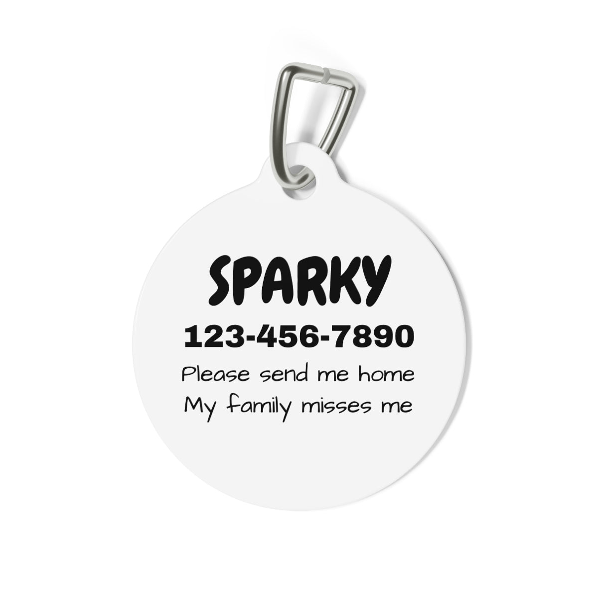 Round pet tag with printed text on a white background