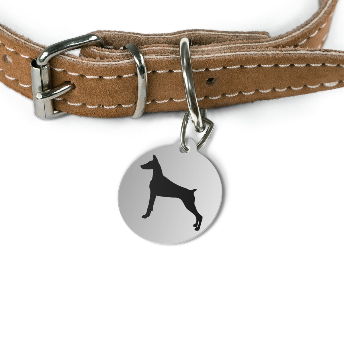 silver tag featuring a dog silhouette on a white background