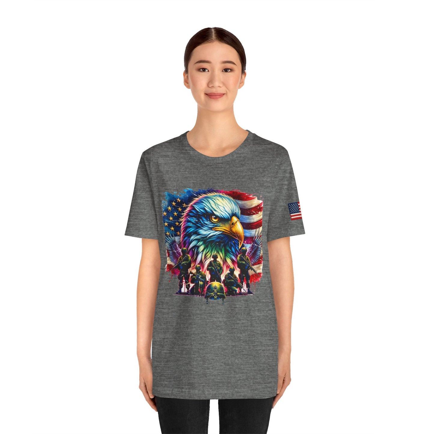 Person wearing a gray t-shirt with an eagle and flag design
