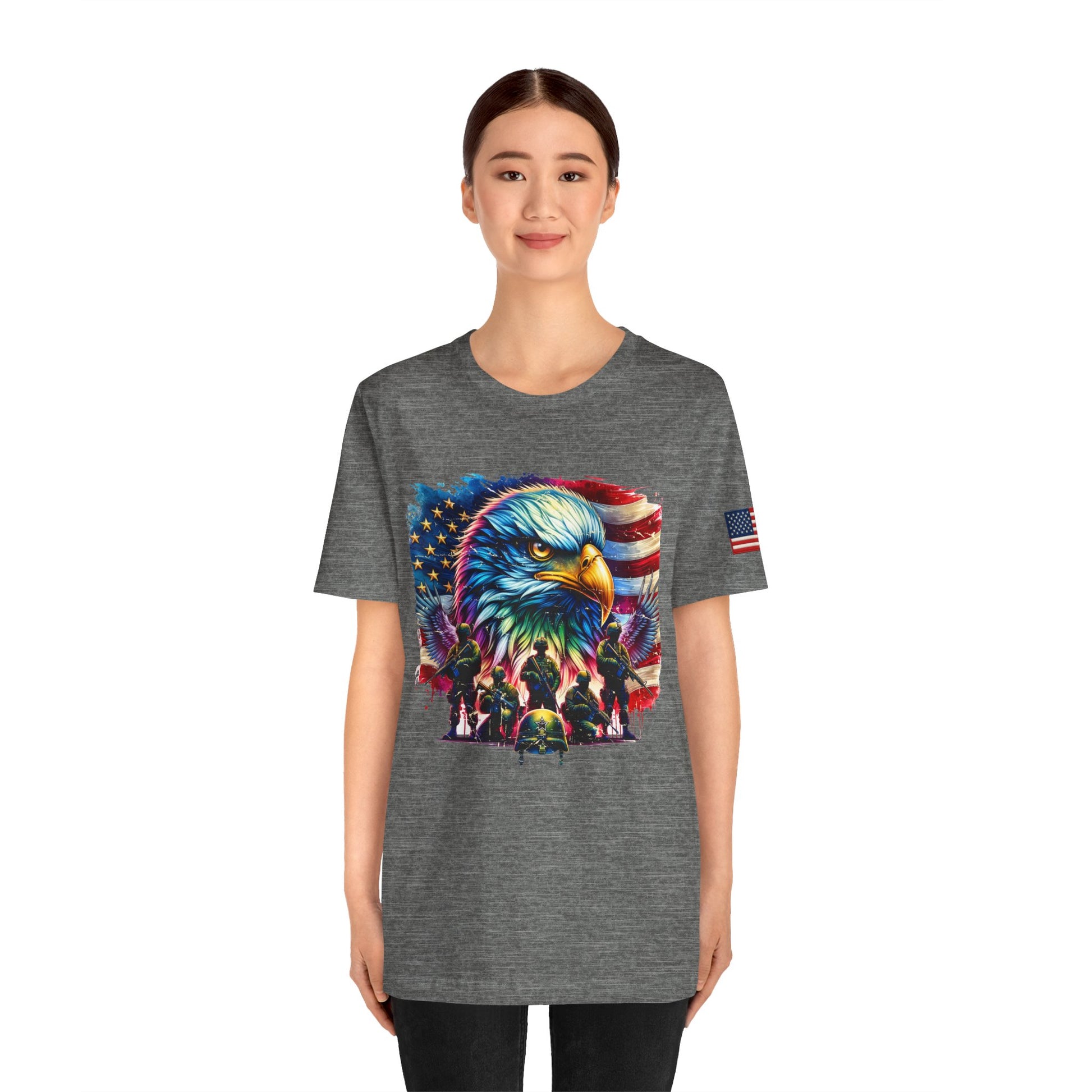 Person wearing a gray t-shirt with an eagle and flag design