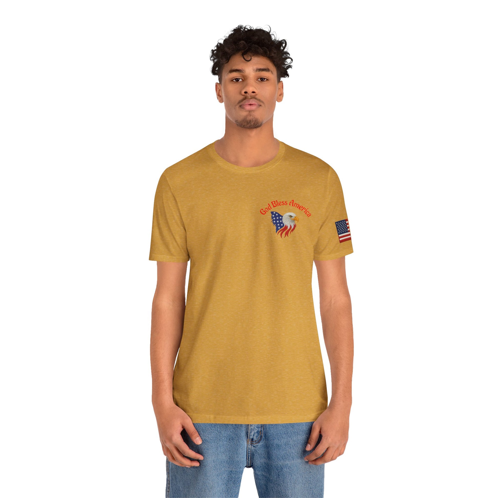 Man wearing a mustard yellow t-shirt with a graphic design