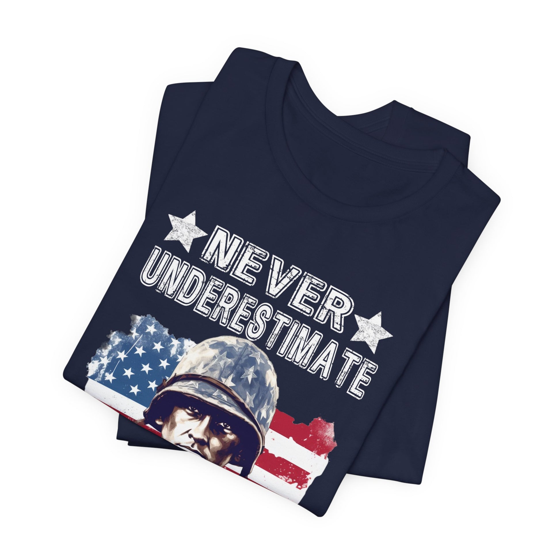 Navy blue t-shirt with graphic design and text 'Never Underestimate'