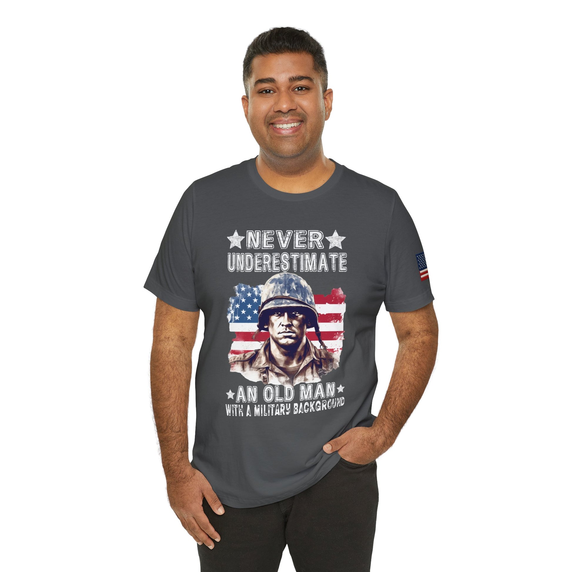Man wearing a gray t-shirt with a graphic and text