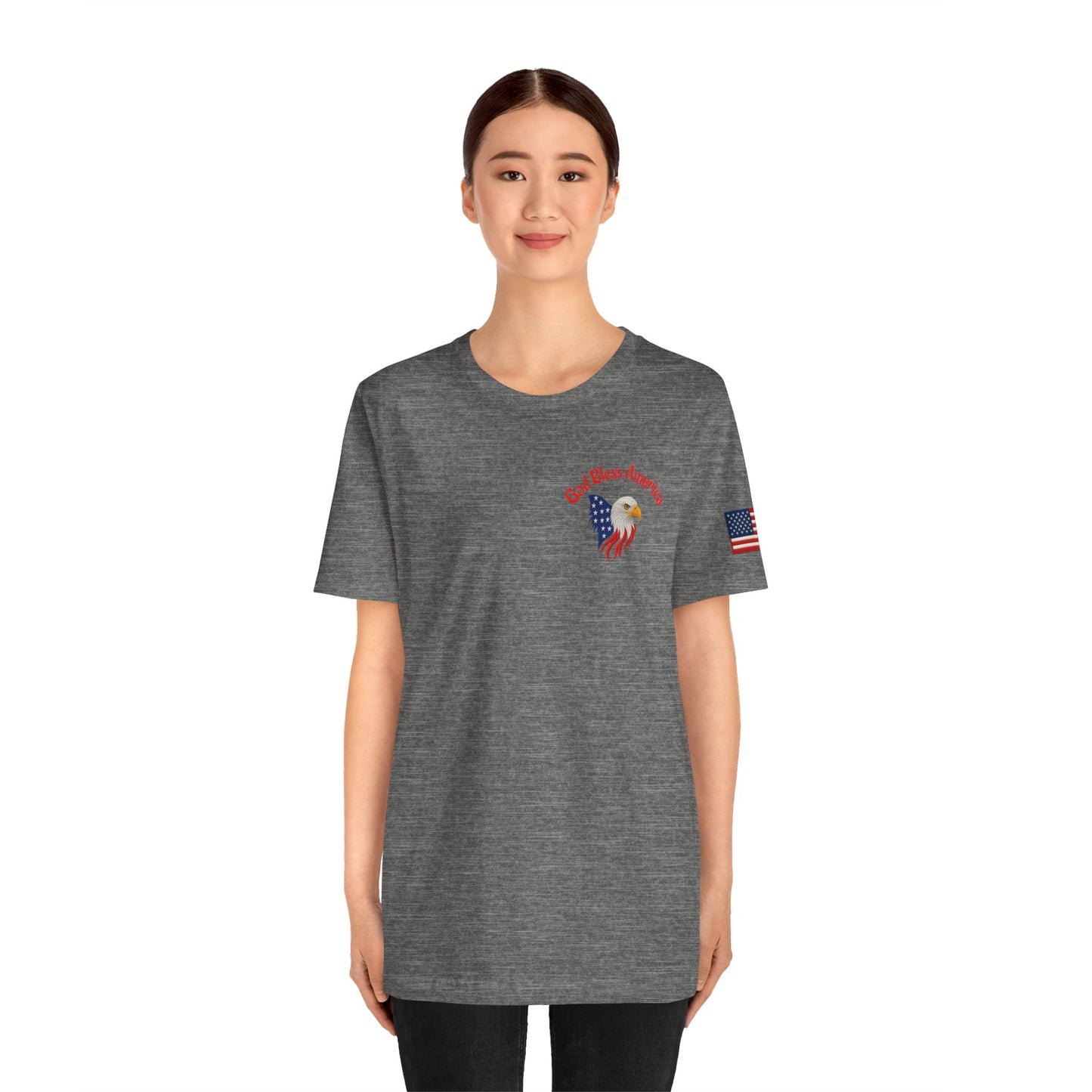 Person wearing a gray t-shirt with a design
