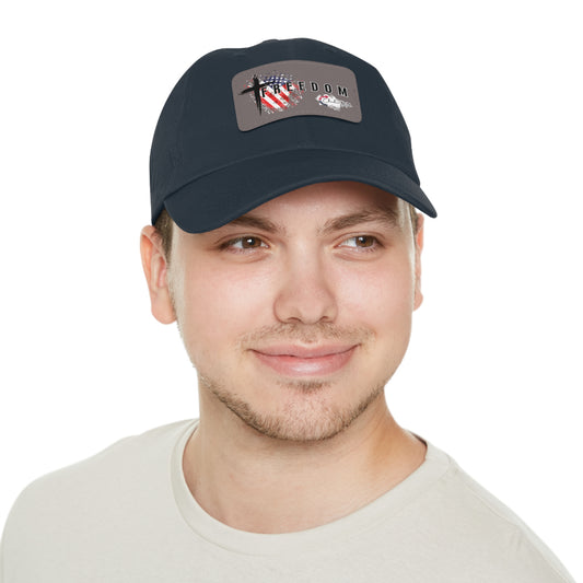 Man wearing a navy blue cap with a Freedom Turning Point Charlie Kirk Patch