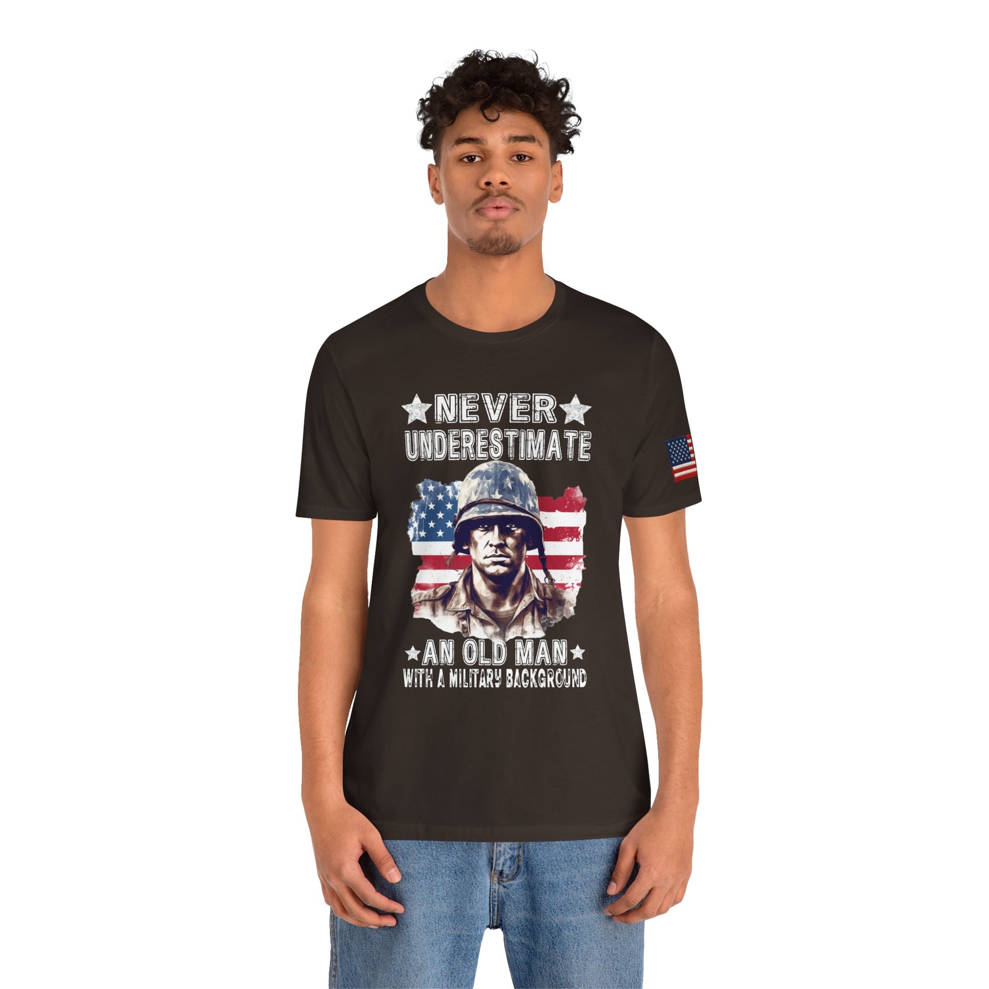 Man wearing a brown t-shirt with a graphic and text