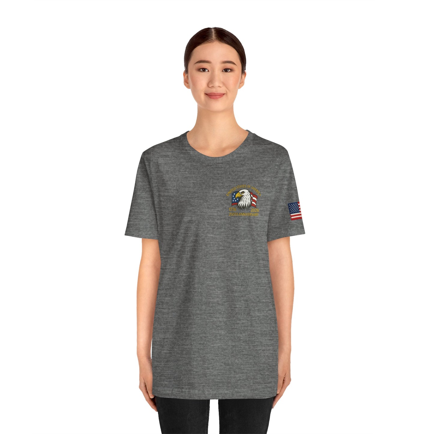 Girl wearing a gray t-shirt with an eagle emblem