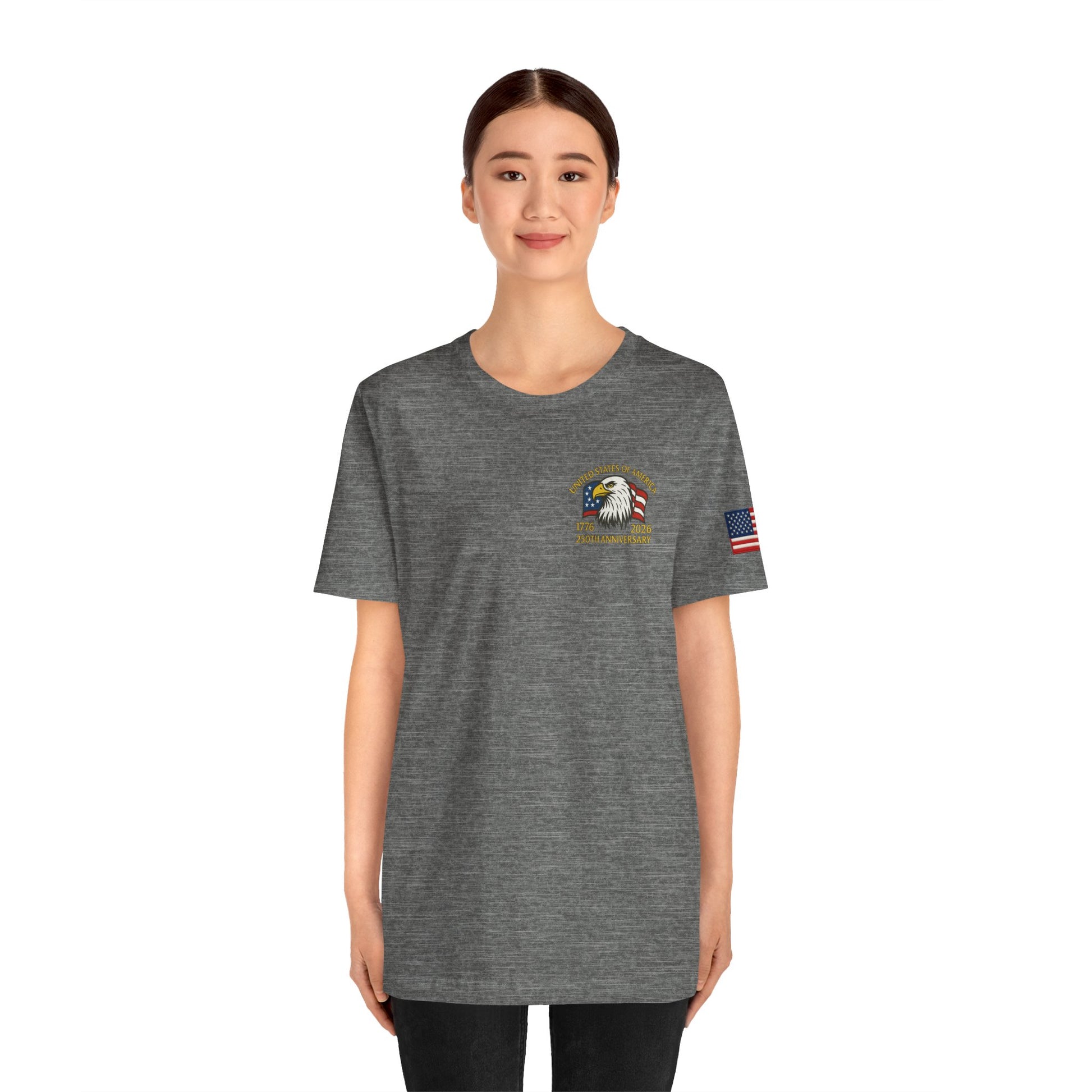 Girl wearing a gray t-shirt with an eagle emblem