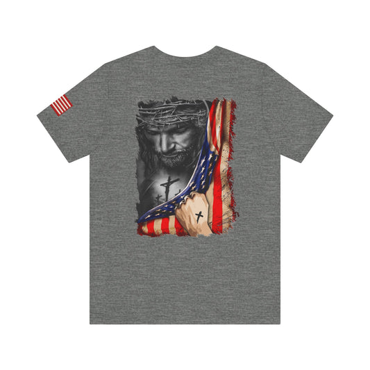 Grey t-shirt back with a graphic design of Jesus with a cross and American flag