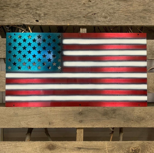 Metal American flag on a wooden background