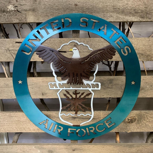 Metal sign with 'United States Air Force' and an eagle emblem on a wooden background