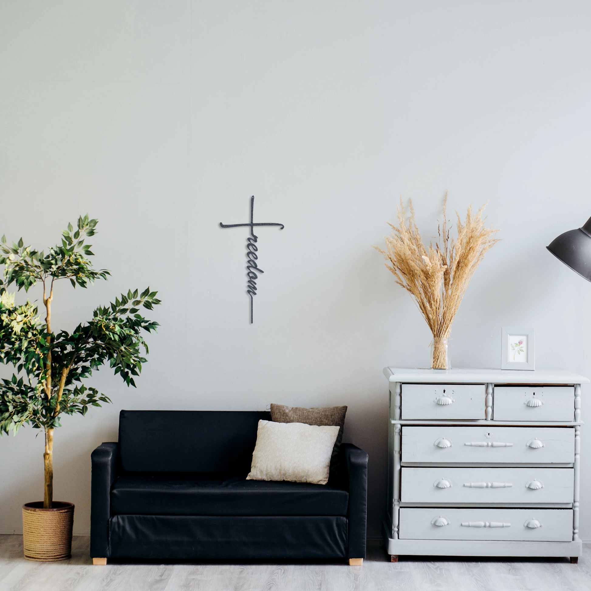 Metal wall cross symbolizing faith and liberty