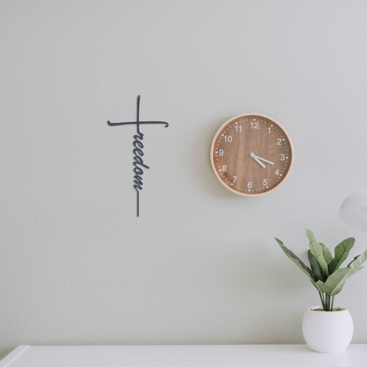 Metal wall cross symbolizing faith and liberty