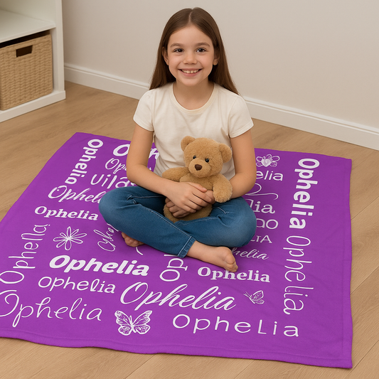 Ophelia showing off her plush purple Custom Name Blanket