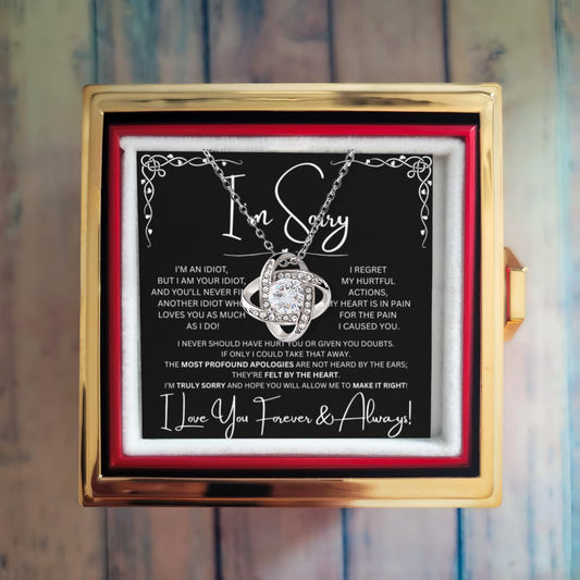 I'm Sorry Love Knot Necklace in preserved red rose box with black card