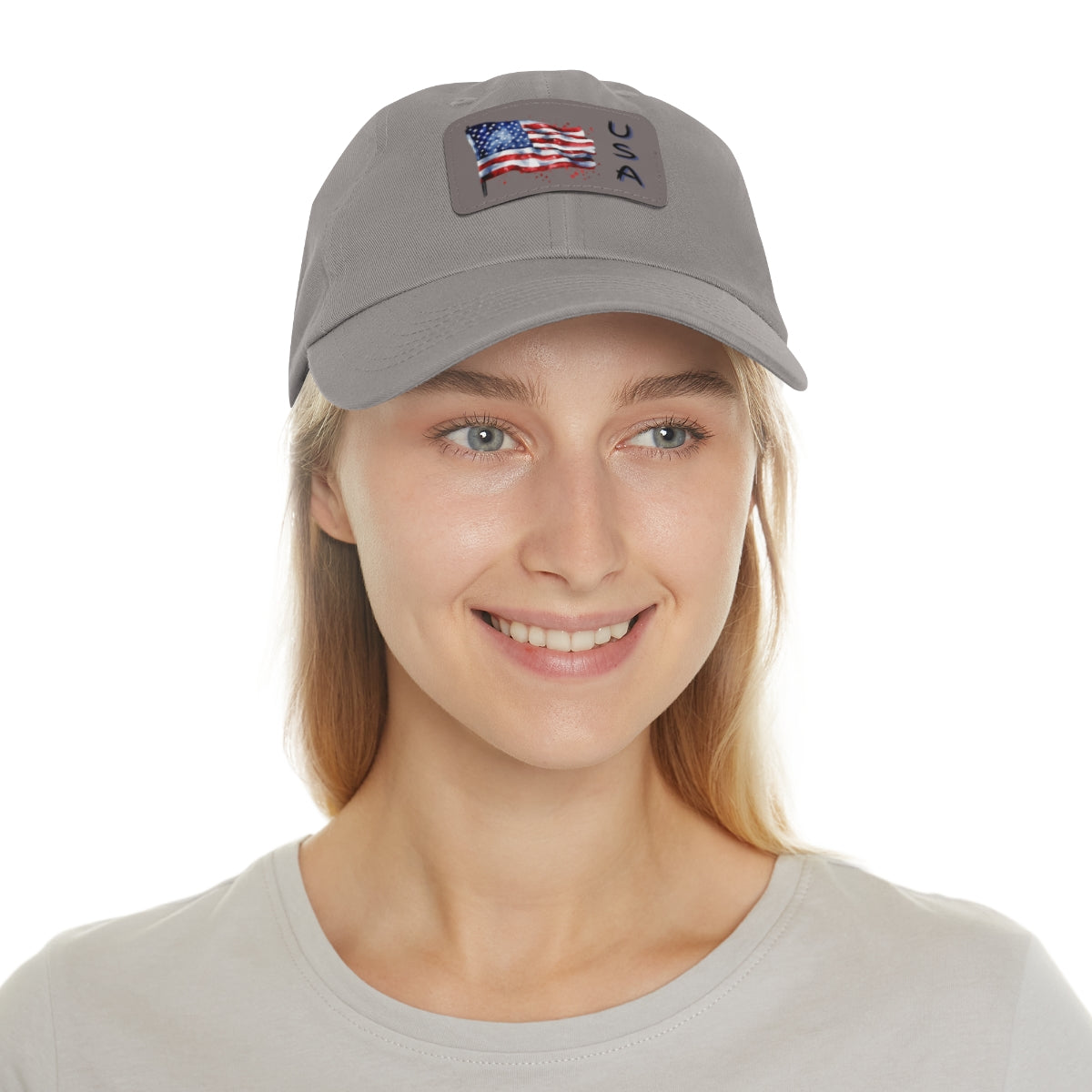 Woman wearing a gray cap with an American flag patch