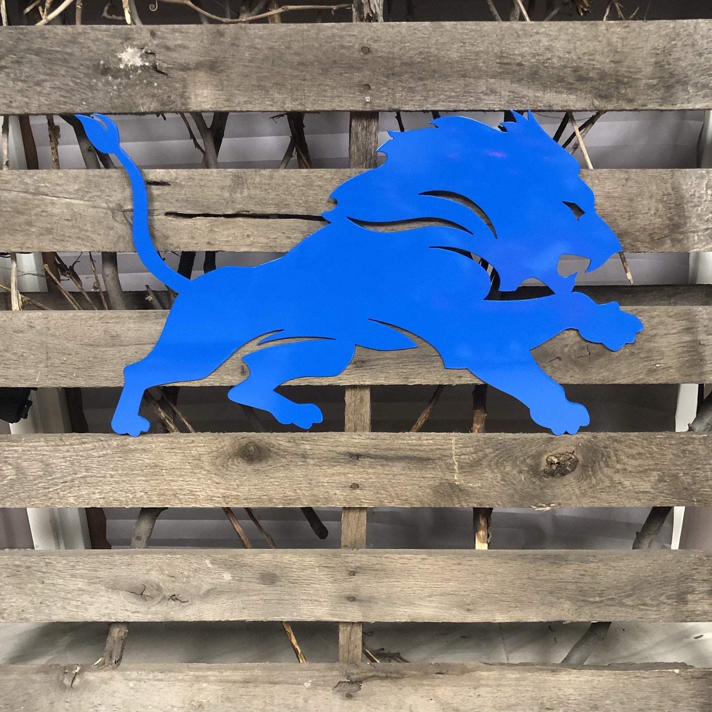 Blue Detroit Lions Metal Sculpture Silhouette on a wooden pallet