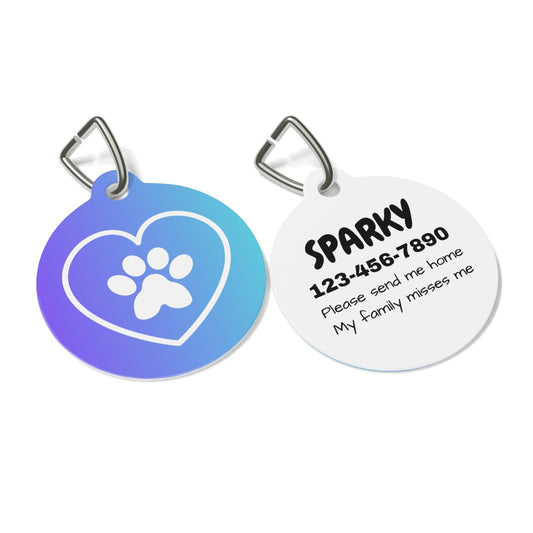 Two round pet tags, one with a heart and paw print design, the other with text and contact information.